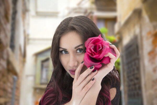 woman with big red rose