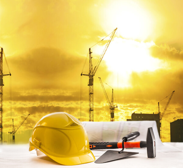 tools yellow helmet hammer trowel   