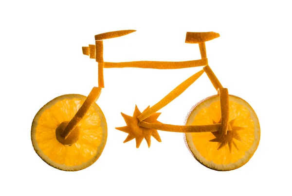 Велосипед из нарезанного апельсина — стоковое фото