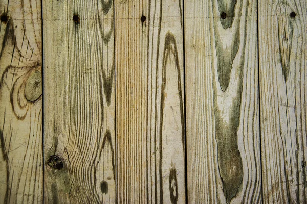 Stuk van nieuwe houten gele hek — Stockfoto