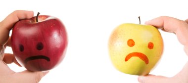 Two  apples smiling and crying