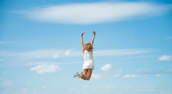 young Woman Jumping for Joy