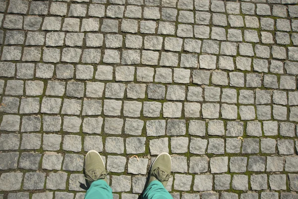 person standing on Concrete paving slab