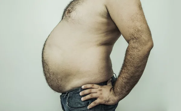 Gran estómago de un hombre gordo —  Fotos de Stock