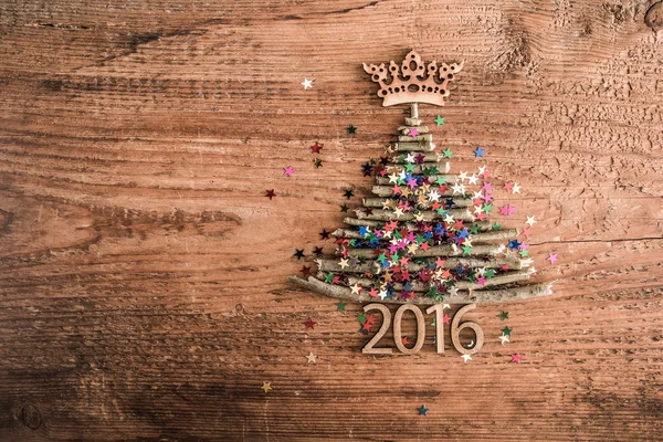 A sok színes csillag a karácsonyfa — Stock Fotó