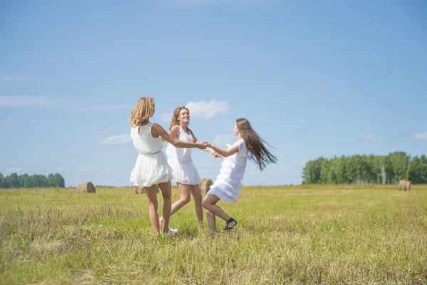 Young women dancing Stock Picture