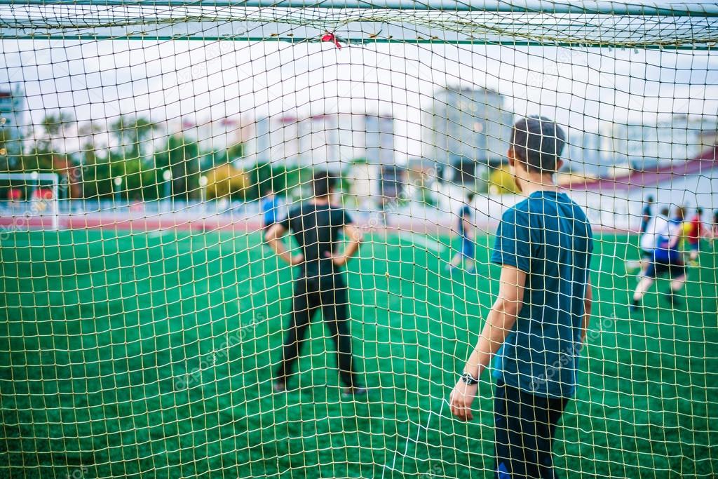 goalkeeper and football players