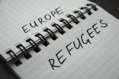 border between words europa and refugees clipart