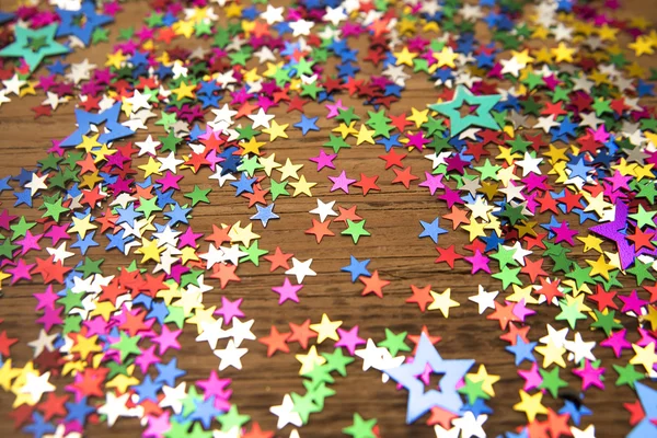 Fundo de Natal com estrelas coloridas — Fotografia de Stock