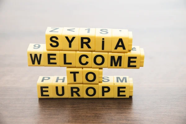 Сирія Ласкаво просимо в Європі тексту — стокове фото