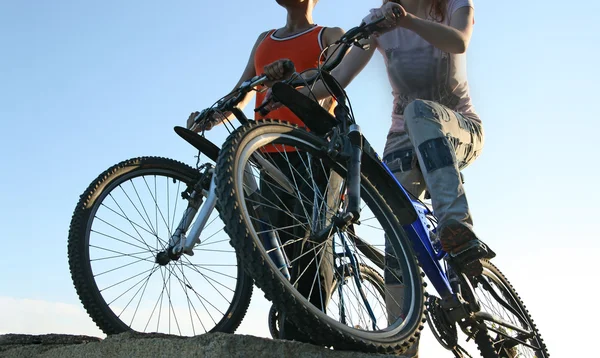 Couple riding bikes