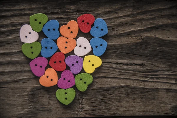 Wooden colorful buttons forming heart — Stock Image Wooden colorful buttons forming heart Royalty Free Stock Photos