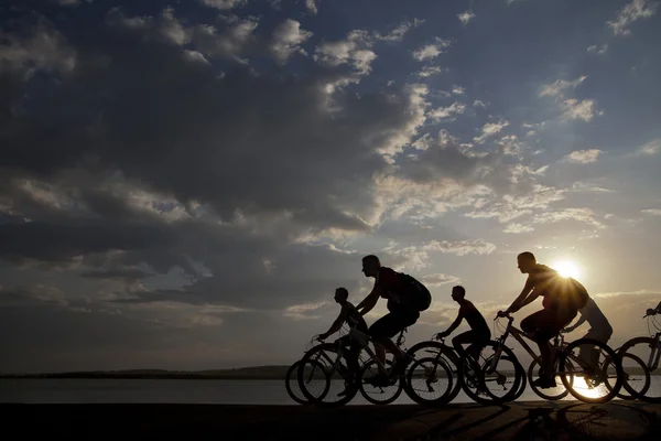 Company of friends on bicycles — Stock Photo, Image