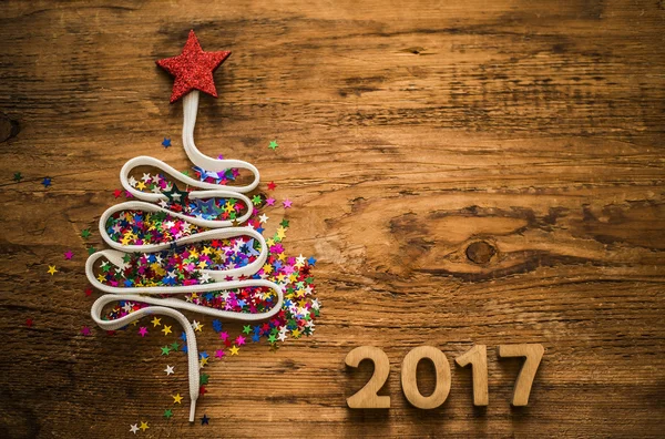 Julgran från konfetti och spetsar — Stockfoto