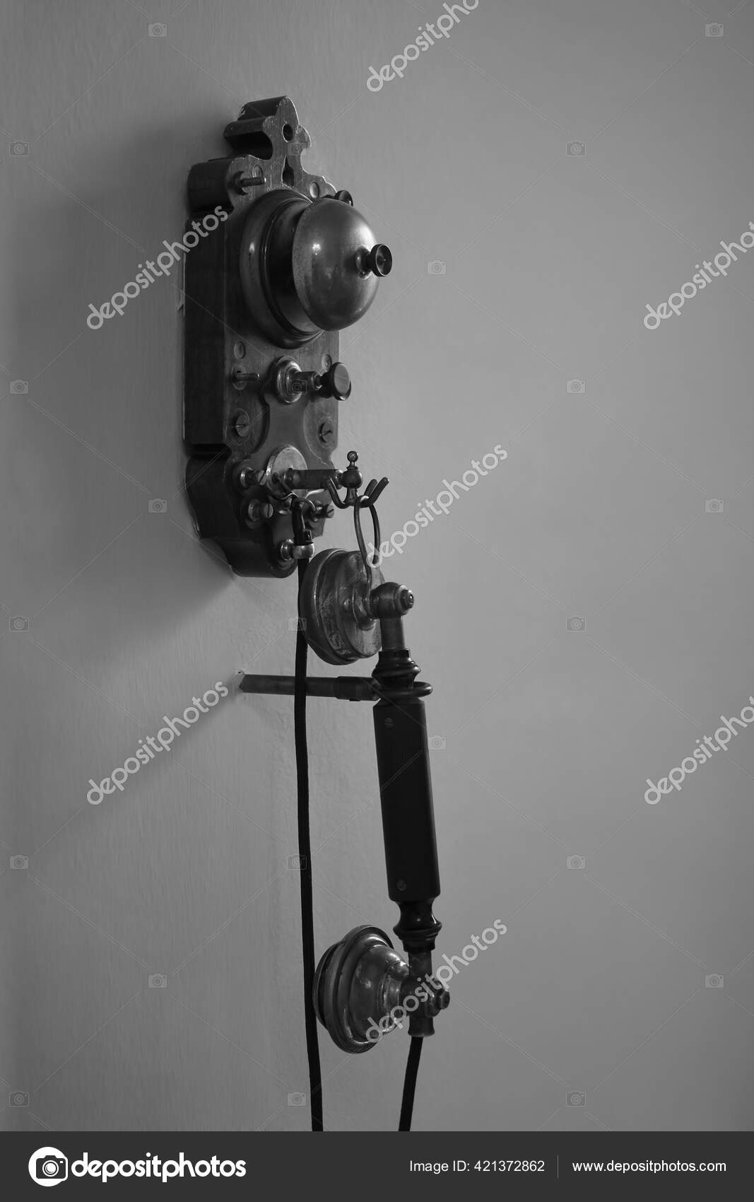 Old Fashioned Black Wall Mounted Telephone Stock Photo by ©borjomi88 421372862