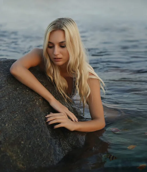 Fish Swim Young Blonde Woman Wear White Bikini Sit Stone — Stock Photo, Image