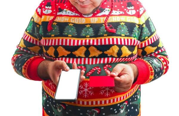 수염이 Mas 구매자는 스마트폰과 카드를 소지하고 남성이 카드를 산타의 머리쓰개를 — 스톡 사진