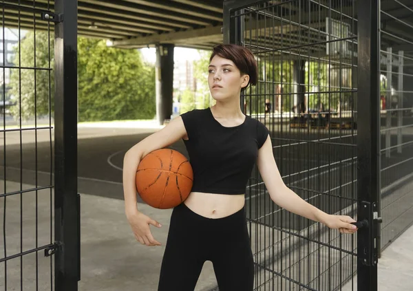 Caucasian Girl Standing Fence Outdoor Street Basketball Court Holding Ball — Stock Photo, Image