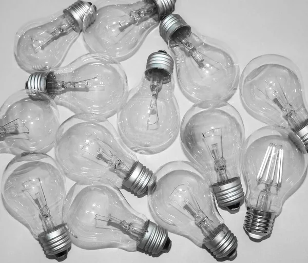 Many New Incandescent Lamp Bulbs Paper Background Top View — Stock Photo, Image