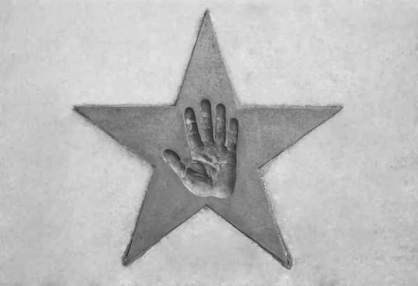 Hand Print Golden Star Concrete Background — Stock Photo, Image