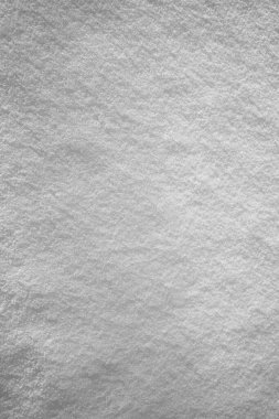 Kar yağışı yüzeyi. Beyaz, taze kar arka planı. en üstteki görünüm.