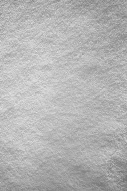 Kar yağışı yüzeyi. Beyaz, taze kar arka planı. en üstteki görünüm.