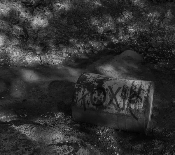 Rusty Metal Barrel Sticking Out Brown Soil Dirty Yellow Clay — Stock Photo, Image