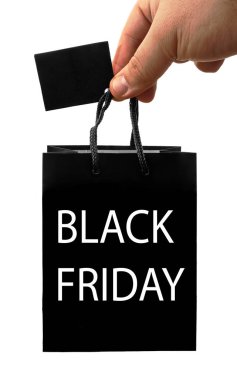 Boş siyah çanta, el ele tutuşarak hazırlanıyor. Boş kağıt maketi, izole edilmiş ellerde. Tüketici paketi logo tasarımı veya kimlik sunumu için hazır. Ürün paketi sapı. Kara Cuma