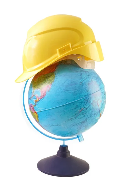 Planeta Construção Capacete Amarelo Isolado Fundo Branco Terra Usando Chapéu — Fotografia de Stock