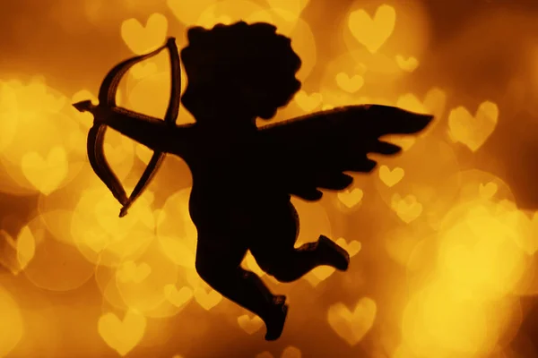 Silhouette Figure Cupid Angel Bow Golden Bokeh Background Place Text — Stock Photo, Image