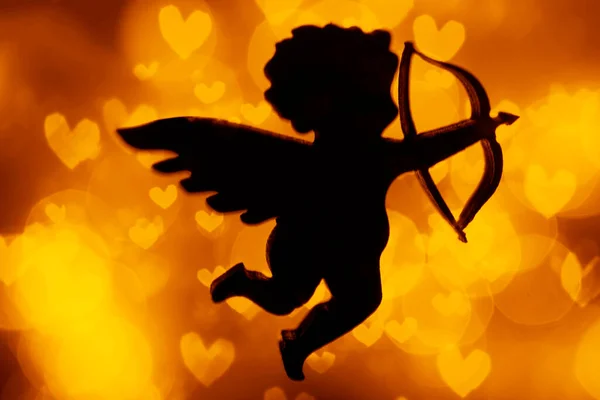 Silhouette Figure Cupid Angel Bow Golden Bokeh Background Place Text — Stock Photo, Image