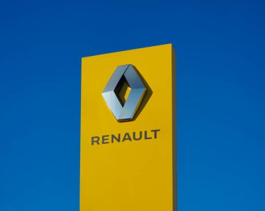 MOSCOW, RUSSIA - FEBRUARY 25, 2021: Sign of a car dealership of the French manufacturer Renault against a summer day.
