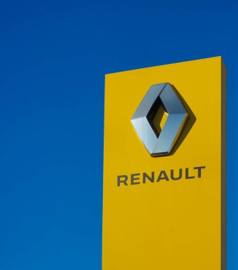 MOSCOW, RUSSIA - FEBRUARY 25, 2021: Sign of a car dealership of the French manufacturer Renault against a summer day.