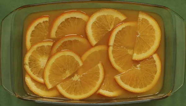 Fresh orange slices in orange juice