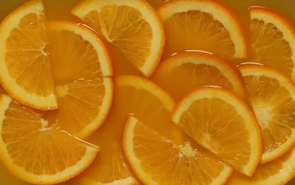 Fresh orange slices in orange juice
