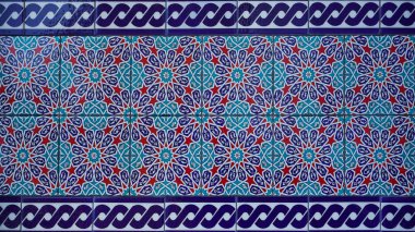 Geometrik şekilli, etnikli, pürüzsüz bir şekil. Yerel Paskalya Asyalı süs eşyası soyut arka planı. Kabile motifi. Boho şıklığı, tekstil baskısı, sayfa dolumu. kiremitlerden yapılmış duvar