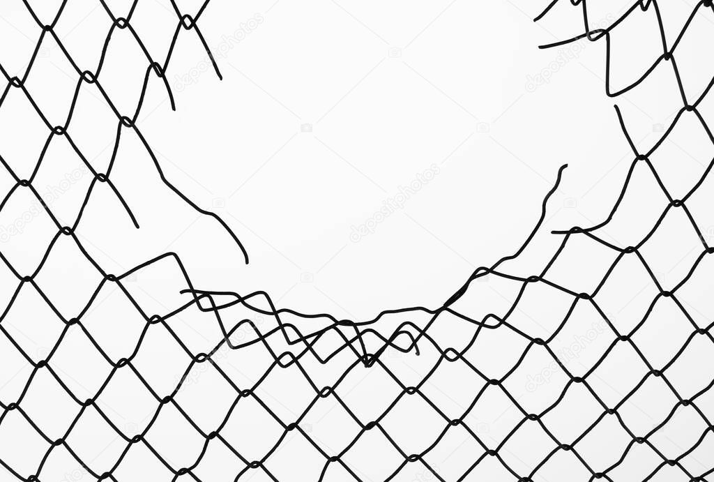 damage wire mesh on white  background. Mesh netting with hole isolated on white  background            