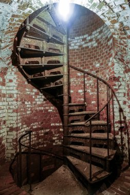 Spiral rusty Staircase in  historical  building. fort number 11. Kaliningrad, Russia. 