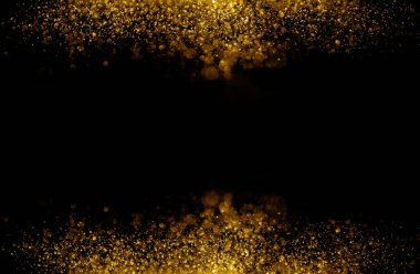 Koyu parlak sarı ışıklar arka planda. Siyah arkaplanda ışıklar. 