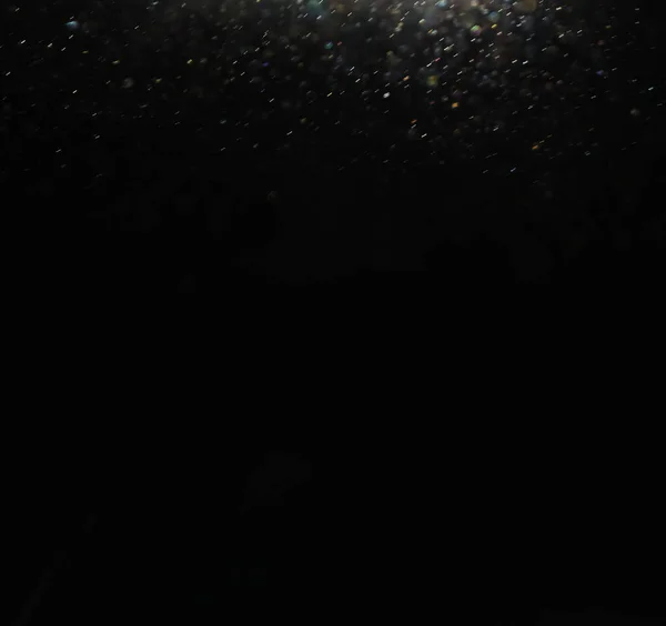 Koyu Renkli Işıklar Arka Planda Siyah Arkaplanda Işıklar — Stok fotoğraf