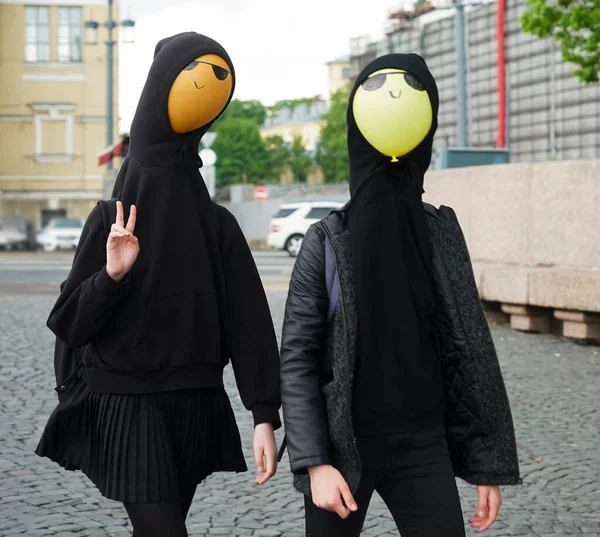 Young Girls Wearing Black Hoodie Walking Street Balloons Hood Faces — Stock Photo, Image