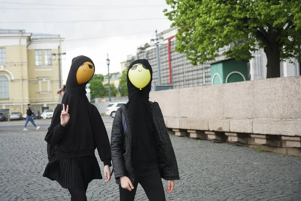 Young Girls Wearing Black Hoodie Walking Street Balloons Hood Faces — Stock Photo, Image