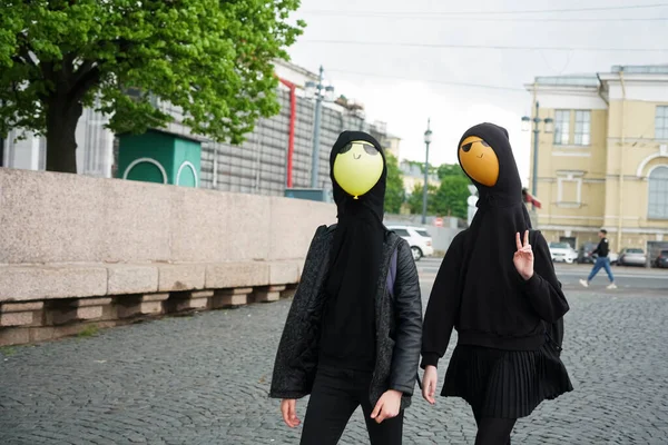 Young Girls Wearing Black Hoodie Walking Street Balloons Hood Faces — Stock Photo, Image