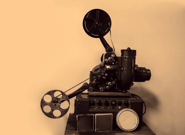 movie camera without a tripod. The motion picture camera image. isolated on  wall background.