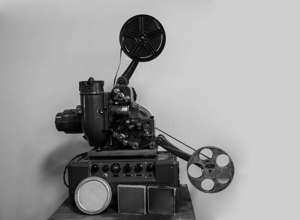 movie camera without a tripod. The motion picture camera image. isolated on  wall background. 