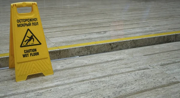 Sign Showing Warning Caution Wet Floor One Yellow Plastic Wet — Stock Photo, Image