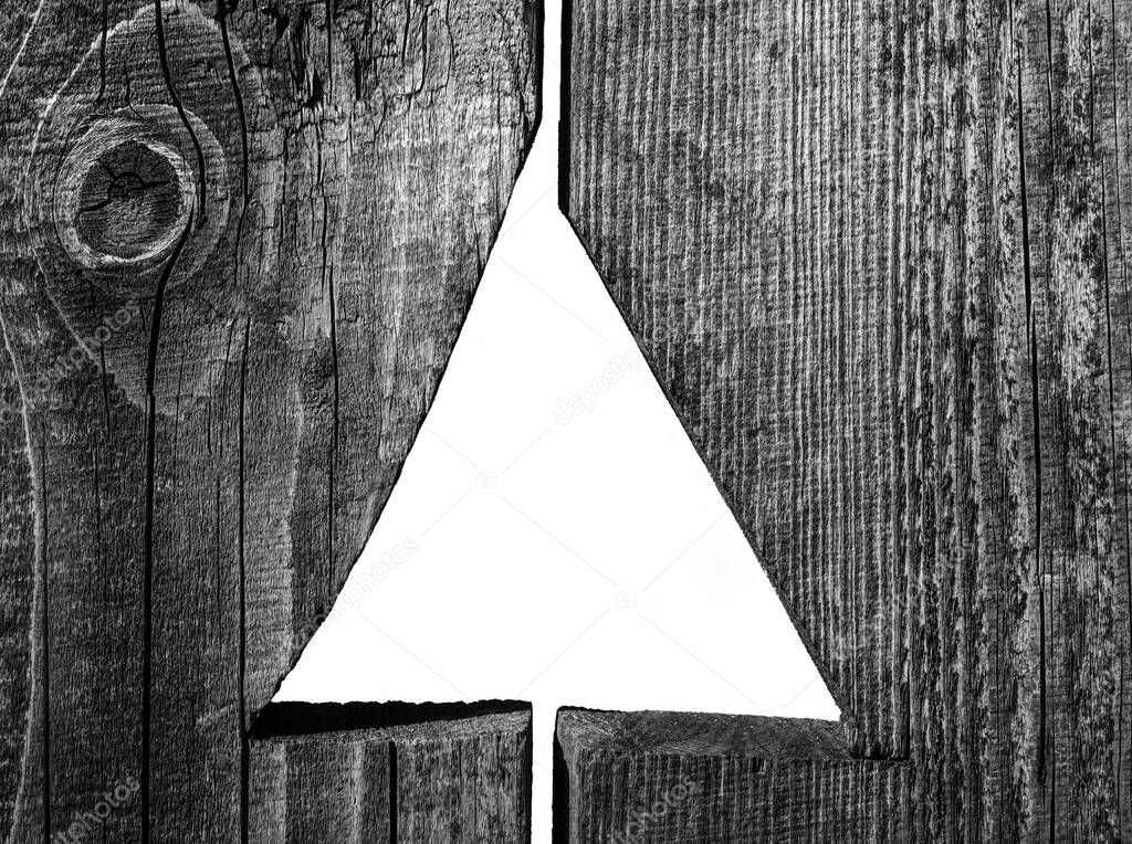 Wall  of wooden panel with one  triangular hole