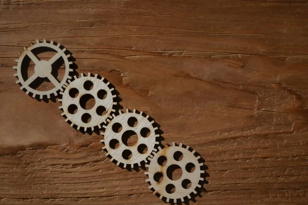 Cogwheels Rotate Together Wooden Board Background Empty Copy Space — Stock Photo, Image