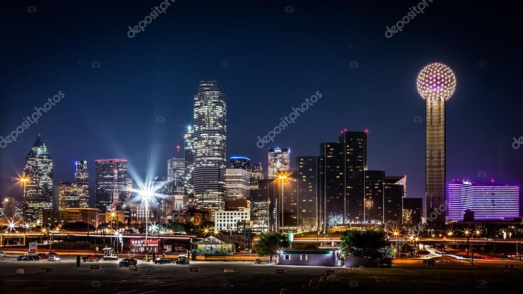 Dallas skyline by night with the Bank of America and Reunion Tower among other skyscrapers in Dallas, USA.