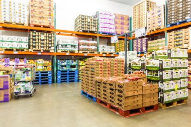 Fresh Produce cold room in a Costco store clipart